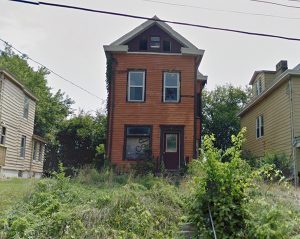 Front of 1314 Manss Avenue in Price Hill from the street, shown prior to renovation.