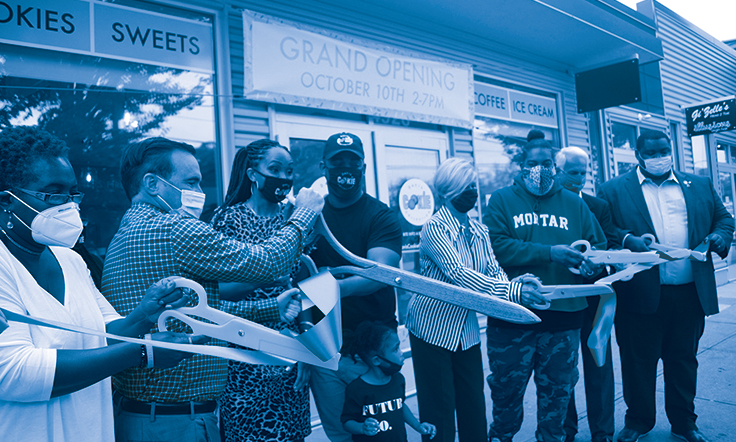 Features Stories - Homepage Davis Cookie Image of ribbon cutting at Davis Cookie Collection in Bond Hill