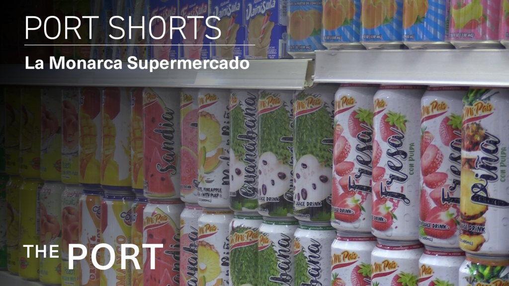 Image of brightly colored cans of juice lined up neatly on a shelf overlaid with the text "Port Shorts: La Monarca Supermercado"