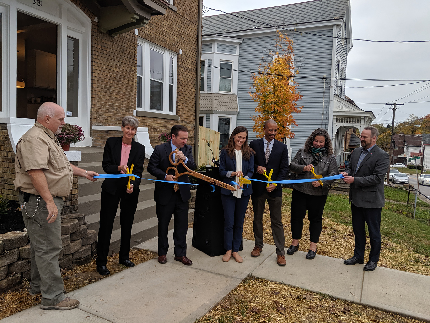 Price Hill Ribbon Cutting - web Photo of official ribbon cutting in front of Price Hill home on St. Lawrence Avenue. neighborhood revitalization